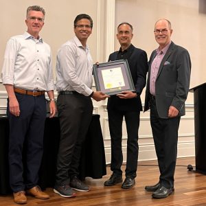 Doctor receiving an award at a ceremony